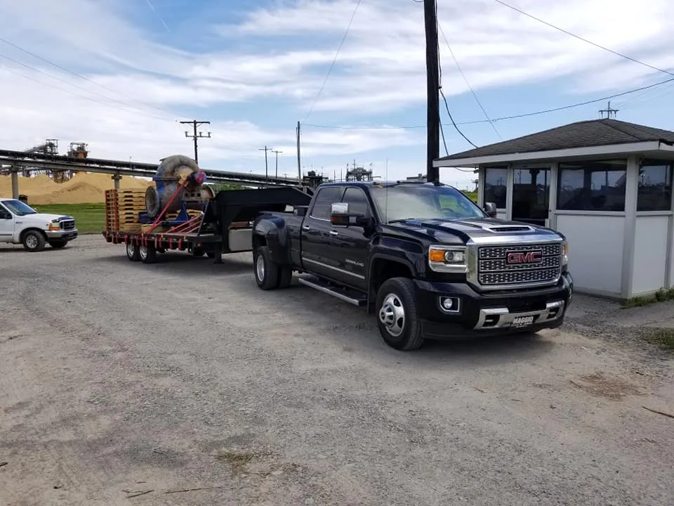 GRAVCO truck delivering industrial pump
